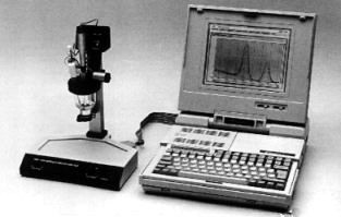 Přenosná Eko-tribopolarografická souprava podle L.Novotného s přenosným počítačem umožňující analytická měření znečištění životního prostředí v terénu.